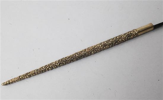 A gold overlaid ink pen.
